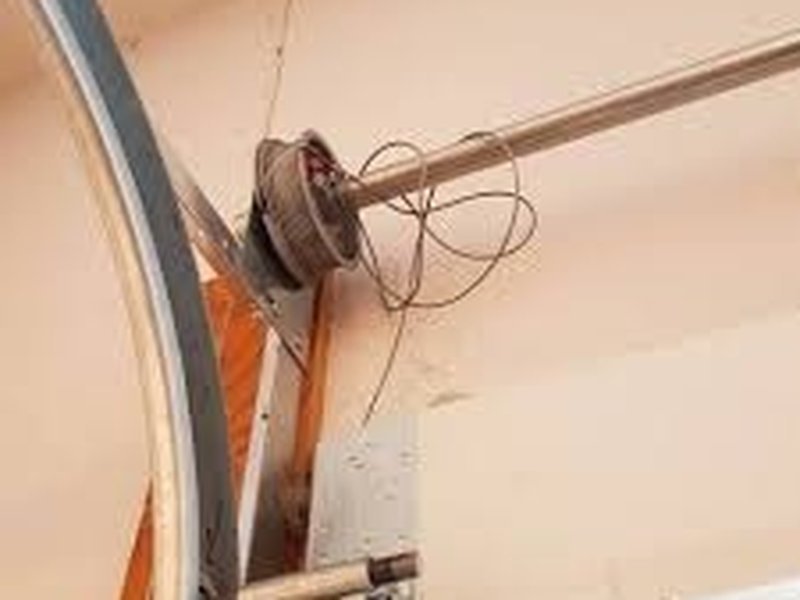 Garage Door Cable Repair work on a garage door